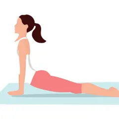 Kvinna i yogapositionen "uppåtgående hund", som kan hjälpa till att lindra solar plexus ångest.